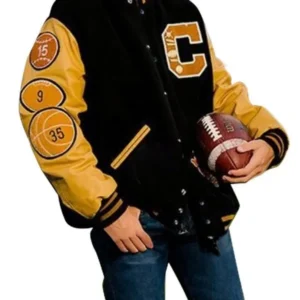 Shop men’s American football letterman varsity jacket. Wool body, leather sleeves, ribbed trims, and classic collegiate athletic style.